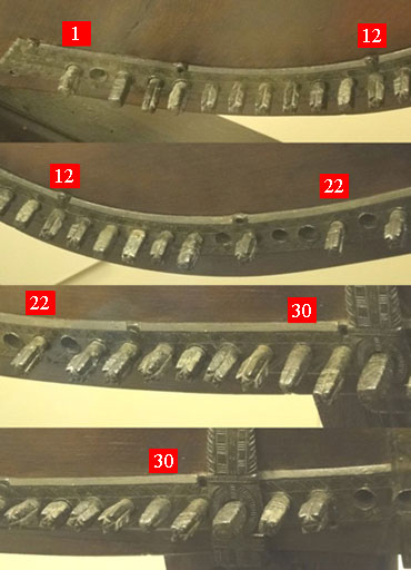 The heads of the tuning pins currently in the neck bands, showing the apparent variety of forms.
